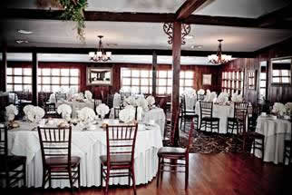 Holidays & Catering 13 Woodsgate dining hall with white table settings