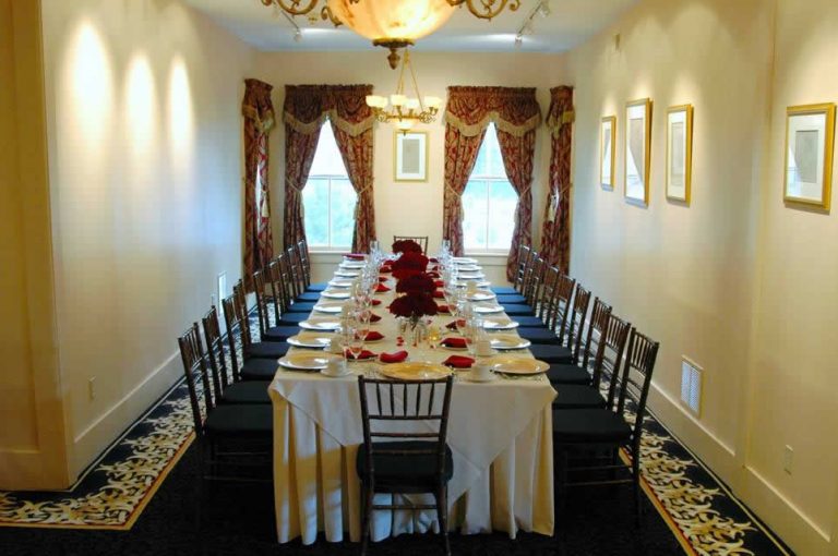 Holidays & Catering 6 The Stroudsmoor Inn Auradell private dining room boasts a long family table with white table cloth and plate settings