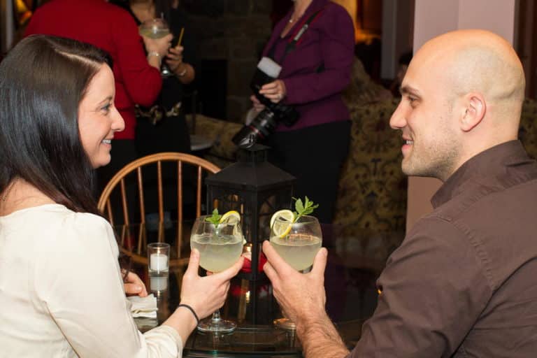 Couple enjoying wine - making toast