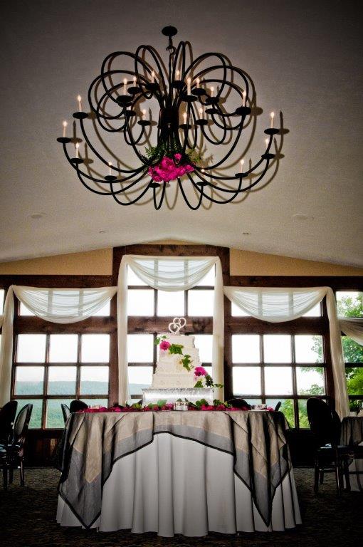Grand dining room with central wedding cake display