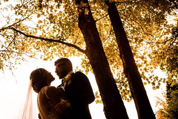 Wedding couple posing outdoors