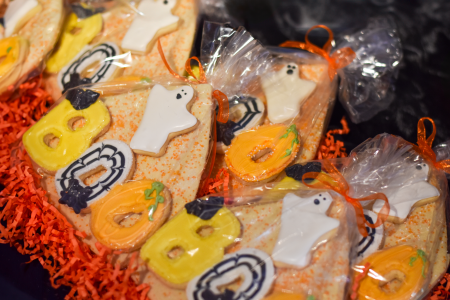 'Boo' ghost cookies lie in rows in bags